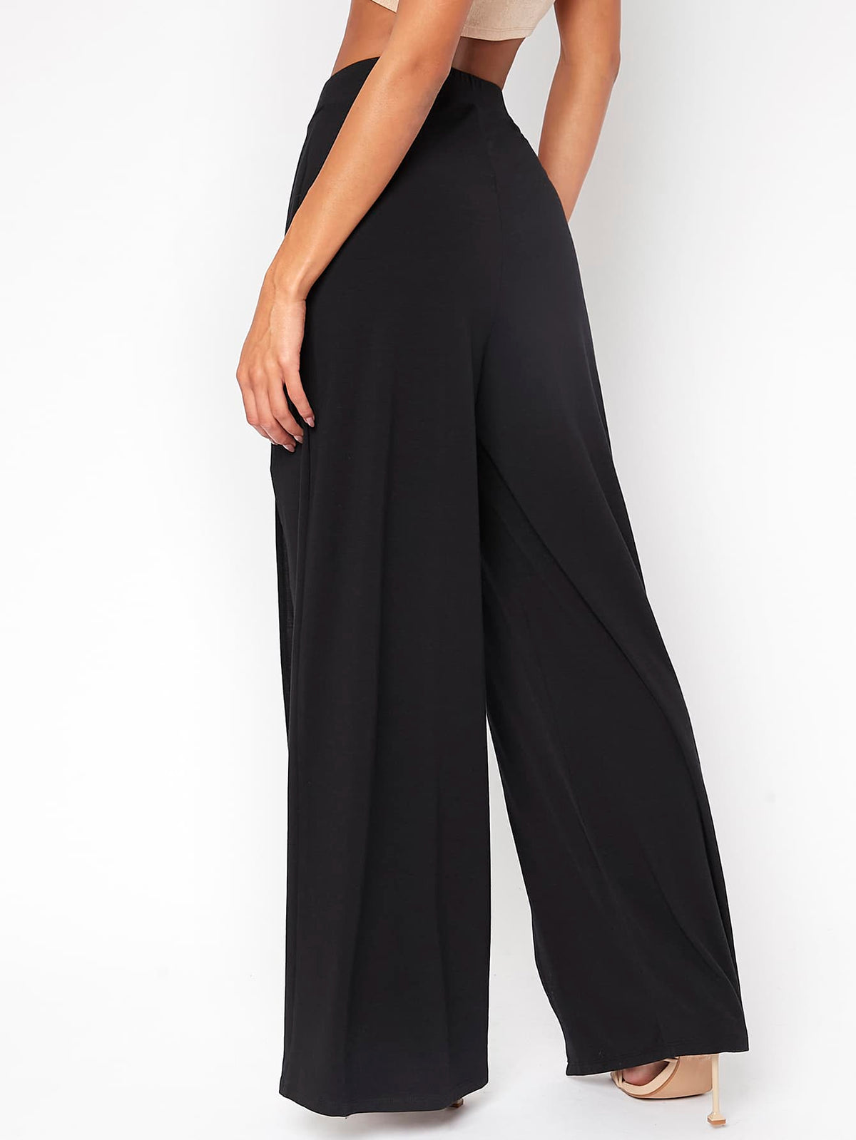 Pantaloni alla moda a vita alta a gamba larga e fruibile laterale di colore unito per donne