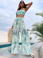 Pantaloni a palazzo con stampa di piante, outfit da crociera per donne