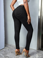 Jeans skinny lavaggio con candeggina flessioni con Sciarpa