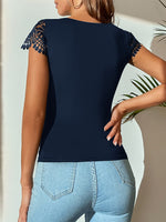 Maglietta pizzo guipure a contrasto collo a cuore