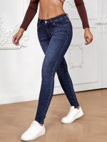 Jeans skinny tasca inclinata
