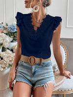 Camicetta con bordo di pizzo manica ad aletta