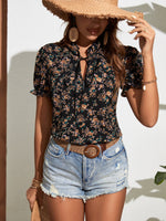 Camicetta con stampa floreale con cravatta al collo con manica a sbuffo