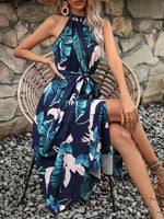 Abito estivo casuale con scollo a Halter e stampa tropicale per le vacanze