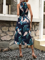 Abito estivo casuale con scollo a Halter e stampa tropicale per le vacanze