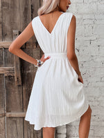 Abito trapezio monocolore con cintura