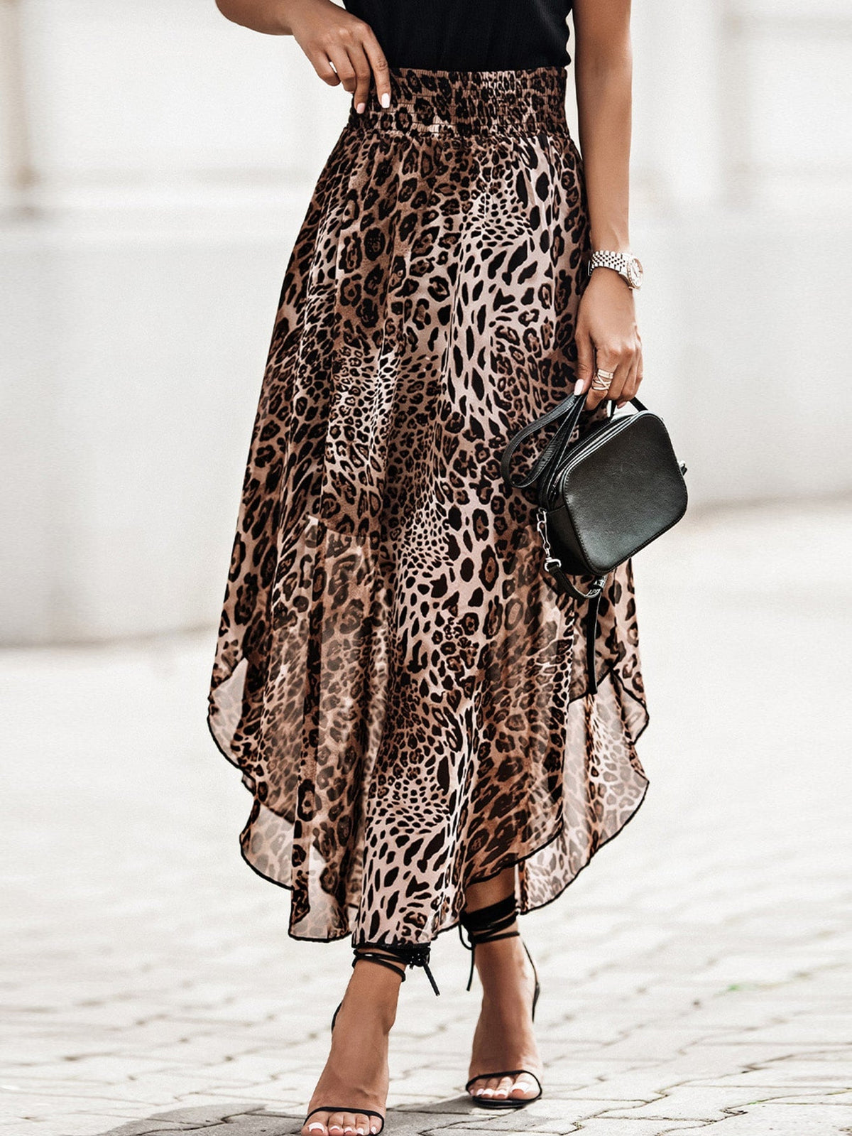 Gonne con stampa leopardo orlo asimmetrico