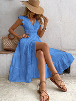 Abito incrociato monocolore con bordo a volant