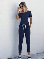 Jumpsuit Maglietta monocolore scollatura asimmetrica con coulisse a vita tasca inclinata