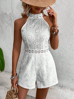 Tutina ricamo ad occhielli zip retro con collo halter