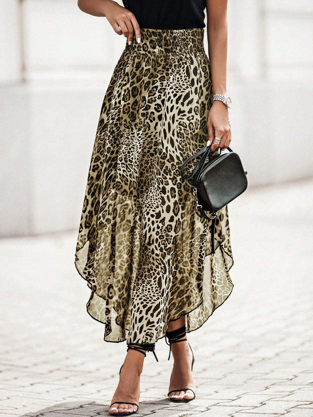 Gonne con stampa leopardo orlo asimmetrico