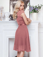 Abito cocktail svasato pizzo floreale corpetto con bordo a volant festa