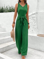 Salopette blu navy con scollo a V e cinturino intrecciato per donne