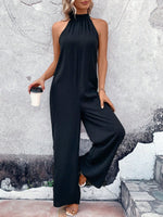 Jumpsuit gamba larga monocolore con collo halter