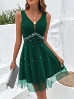 Abito in maglia sovrapposta con perle