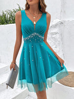 Abito in maglia sovrapposta con perle