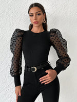 Top in tulle con manica a sbuffo