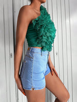 Top monospalla tulle a contrasto stratificato con bordo a volant