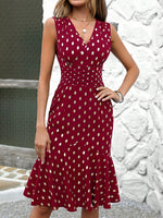 Abiti con stampa a punti dorati con volant