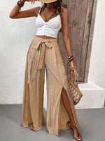 Pantalone casual estivo in tessuto a pieghe solido con vestibilitˆ ampia e taglio largo diviso