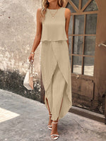 Top di stile vacanziero elegante stampato a pois per signore con pantaloni a gamba larga con spacco avanti