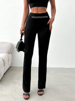 Pantaloni svasati orlo a fessura