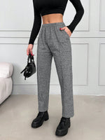 Pantaloni con elastico in vita e tasche inclinate