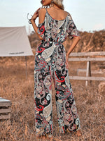 Tuta jumpsuit con spalline sottili, morbida vestibilitˆ, maniche a goccia e stampa all-over