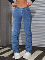 Jeans tasca con patta impilati