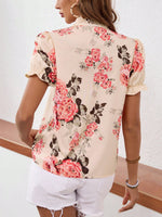 Camicetta con stampa floreale con cravatta al collo con manica a sbuffo