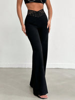 Pantalone Nero A Gamba Larga In Tessuto Di Lycra A Maglia Larga, Con Cintura Elastica A Righe Semi-trasparente E Vita A V