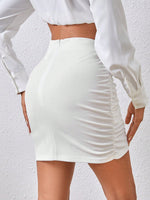 Gonna aderente monocolore plissettato contorto