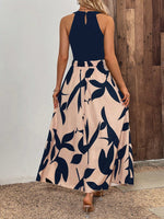 Abito estivo senza maniche con collo rotondo, stampa grafica e fori decorativi