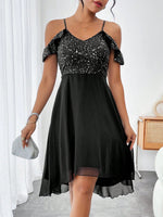 Vestito a trapezio con scollo a V e vita stretta