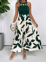 Abito estivo senza maniche con collo rotondo, stampa grafica e fori decorativi