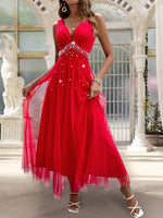 Abito con sovrapposizione a maglia di perline di perle