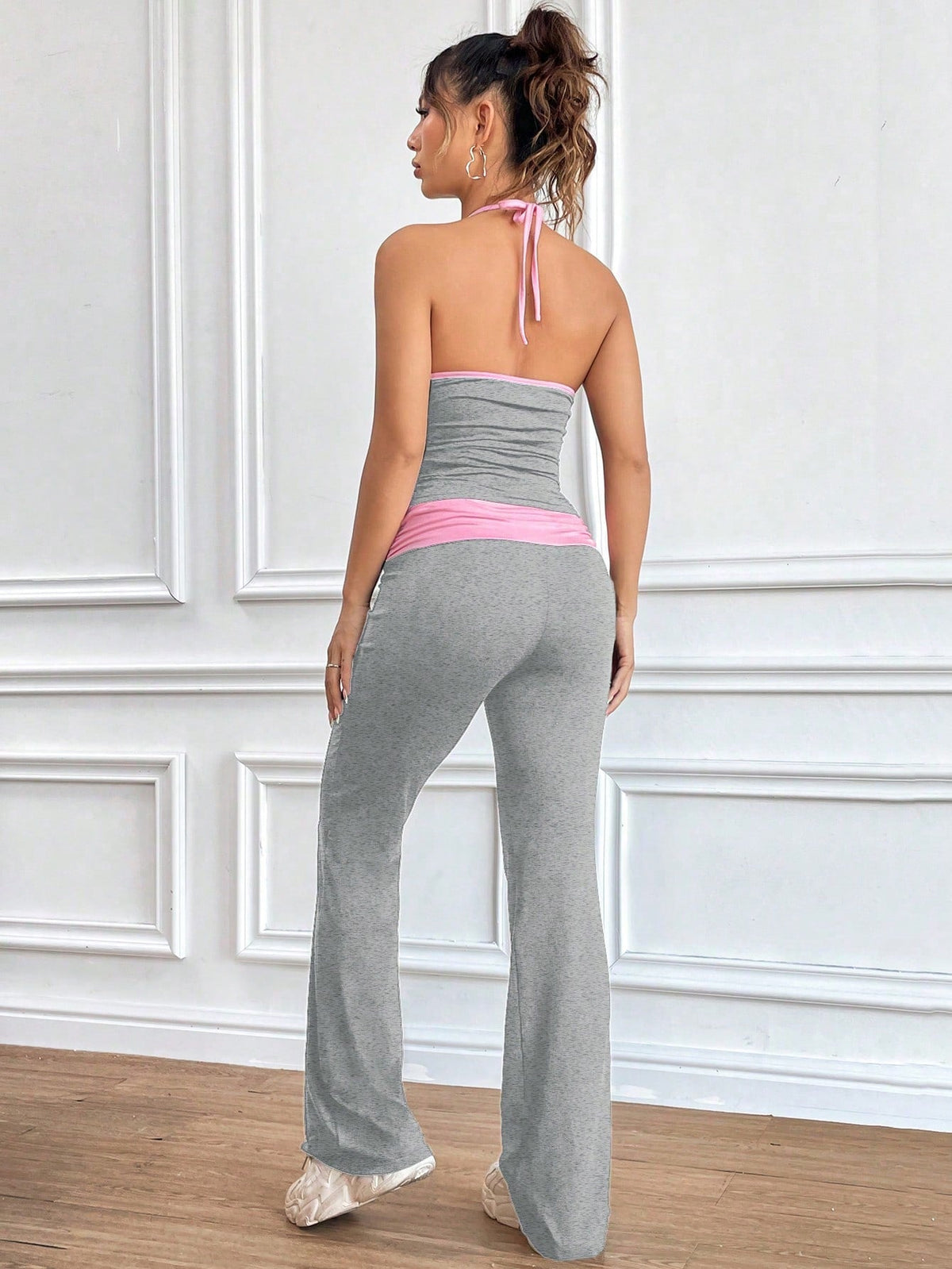 Stampa leopardata in maglia corta e pantaloni lungo impianto di due pezzi per le donne