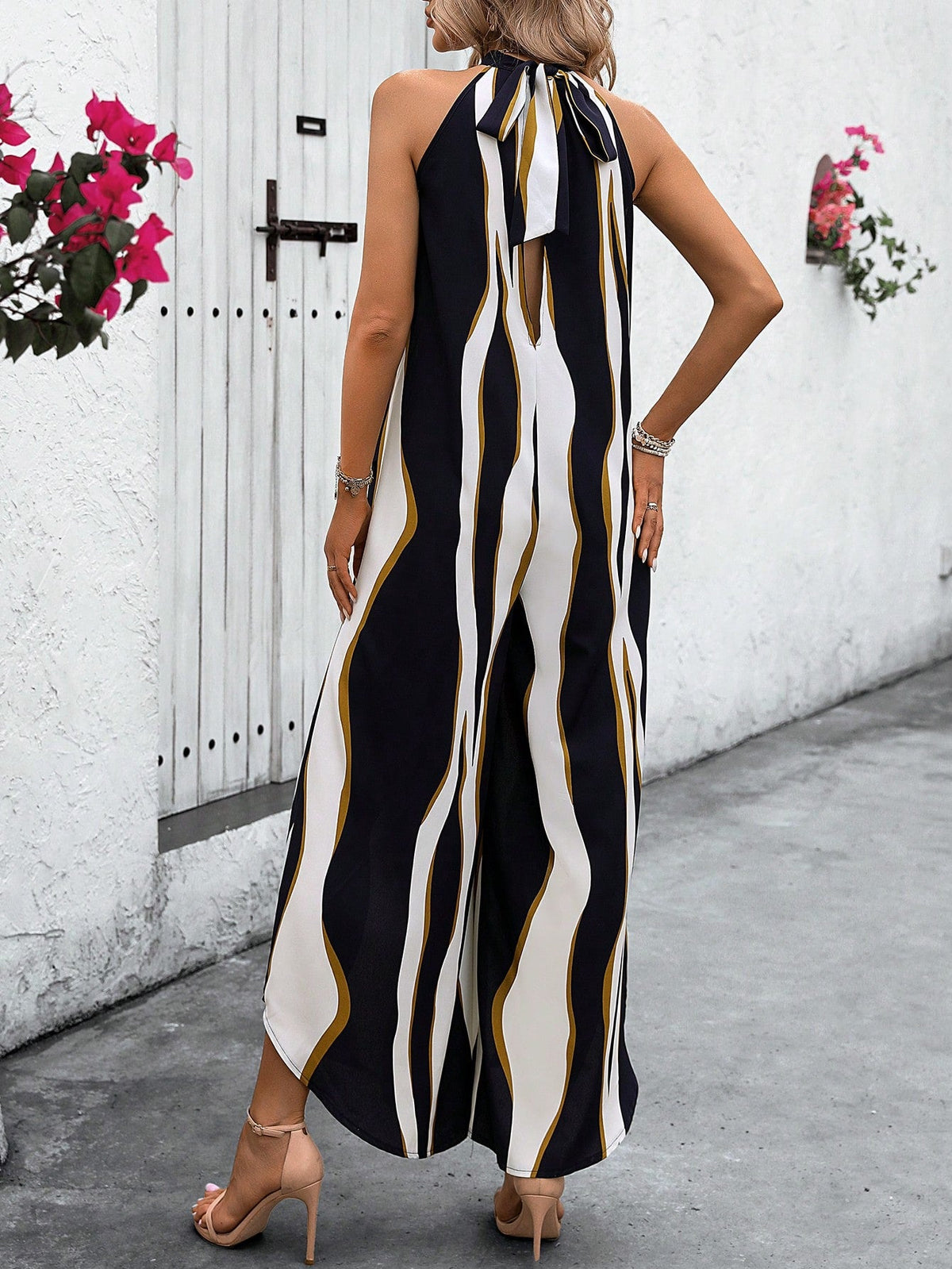 Jumpsuit gamba larga color block con collo halter