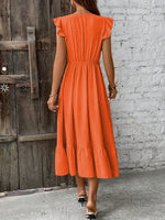 Abito incrociato monocolore con bordo a volant