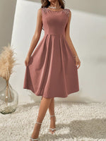 Abito a trapezio monocolore perline