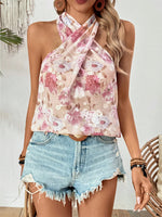 Maglietta estiva senza maniche, con incrocio di alle spalle e stampa floreale per donna