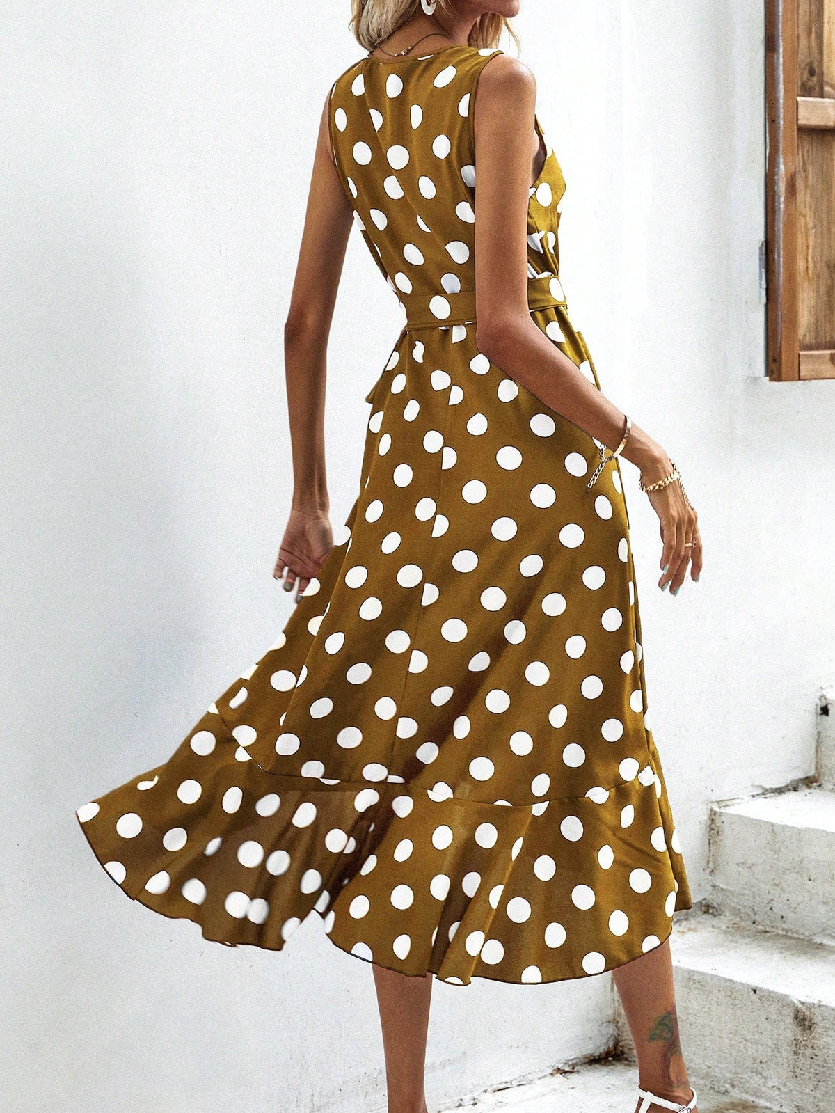 ABito incrociato a pois con nodo laterale