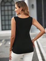 Canotta monocolore orlo asimmetrico