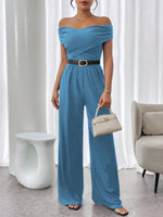 Tuta Elegante Casual A Gamba Ampia Con Pieghe A Spalle Scoperte E In Colore Tinta Unita