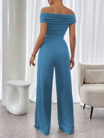 Tuta Elegante Casual A Gamba Ampia Con Pieghe A Spalle Scoperte E In Colore Tinta Unita