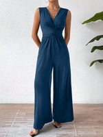 Tuta femminile senza maniche con vita incrociata elegante