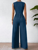 Tuta femminile senza maniche con vita incrociata elegante