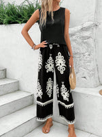 Top senza maniche alla moda di colore solido per donne e pantaloni a gamba dritta stampati