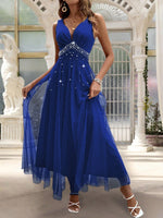 Abito con sovrapposizione a maglia di perline di perle