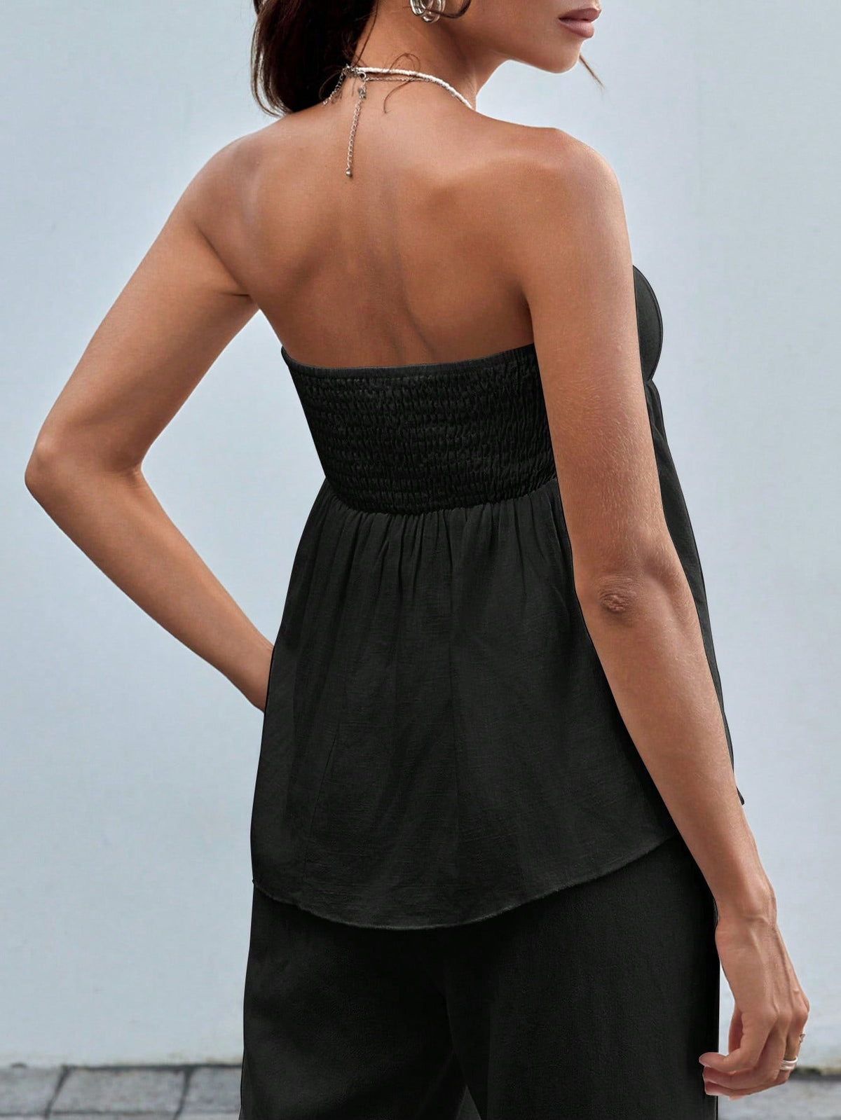 Top a maglia senza maniche a fascia per donne con stampa leopardata